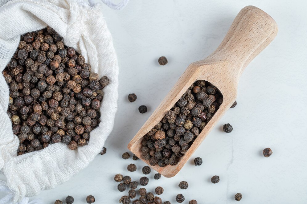 white-sack-full-dried-pepper-gray-surface_114579-77242